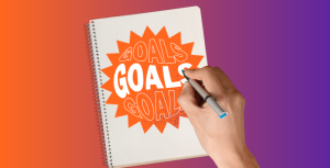 Someone writing their inspiring goal for the year