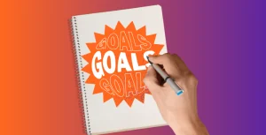 Someone writing their inspiring goal for the year