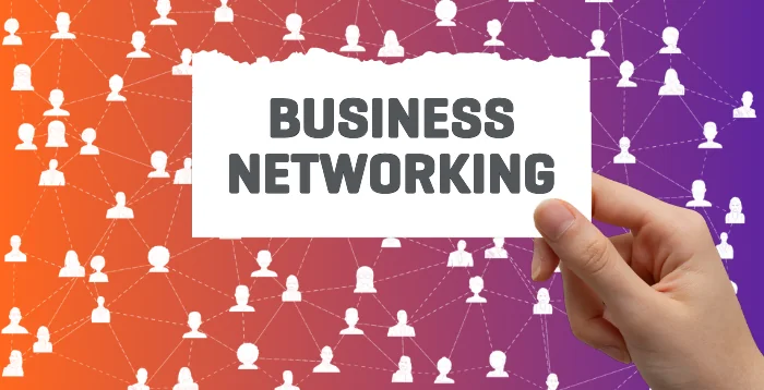 Person holding paper that says Business Networking