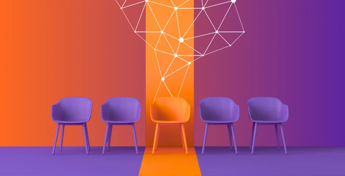 A chair that is highlighted amongst a group of other chairs representing standing out and making a great first impression
