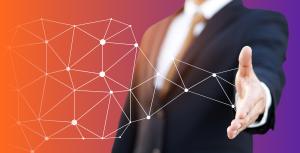 Man in a suit with an outstretched hand to symbolise ways to build networking relationships