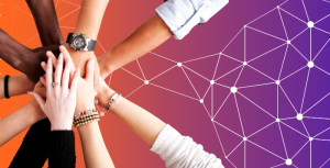 A group of hands in and on top of each other to represent collaboration between businesses